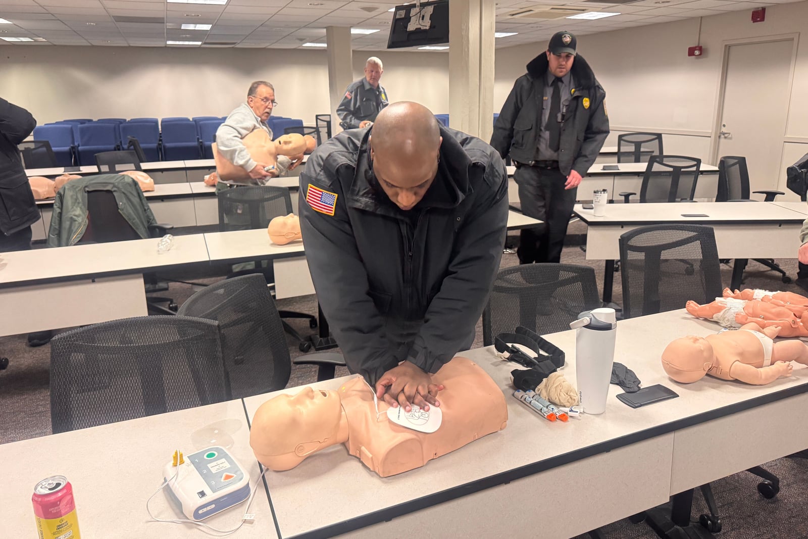 Securemedy officers practising CPR during a training session
