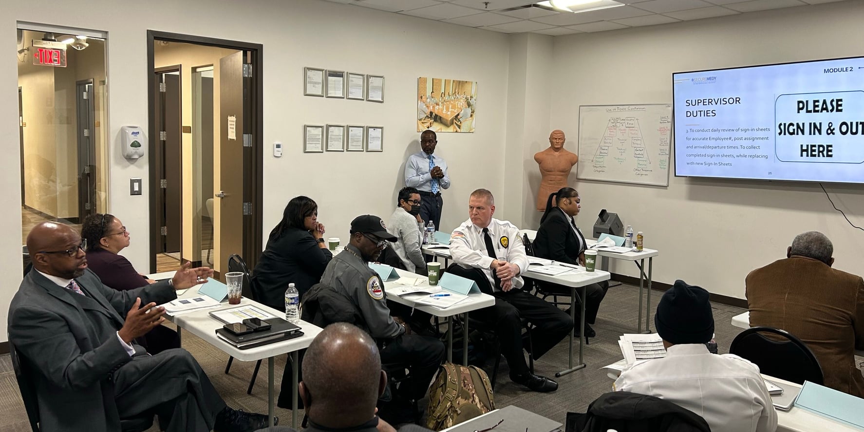 Securemedy team members in a training session