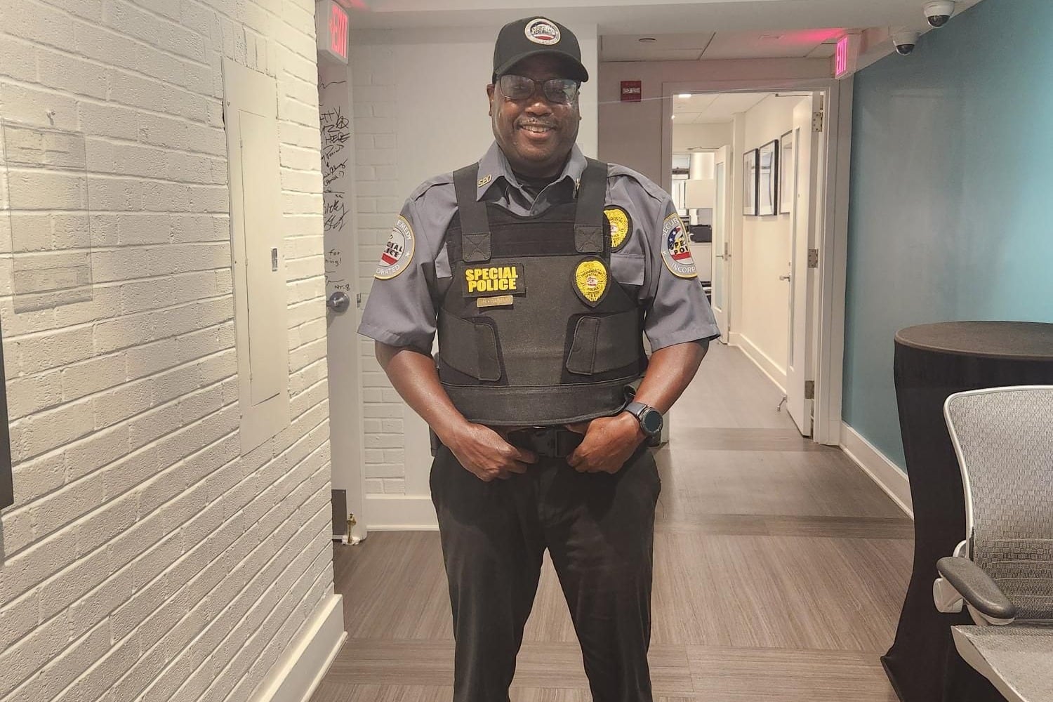 Securemedy special police officer in a grey uniform and Special Police vest